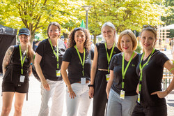 Summer festival 2022 Six women with uniform clothing stand next to each other for a group photo.