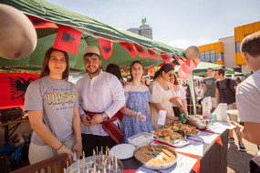 International students present traditional foods at a booth.