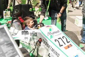 A boy tested the race car of the GET Racing Team