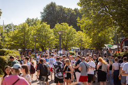Summer festival 2022 Visitors to a summer festival are on a university campus.